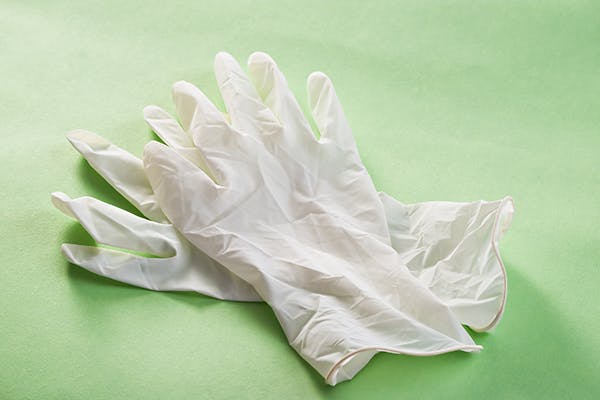 Dog ate 2025 rubber glove